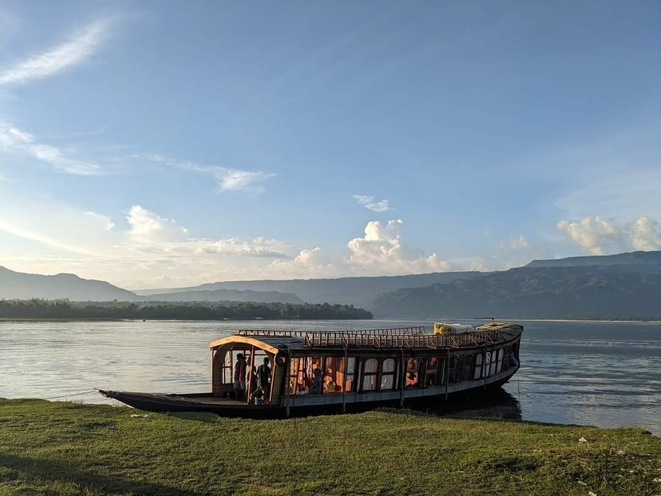 বর্ষা – Serenity of rain and boat